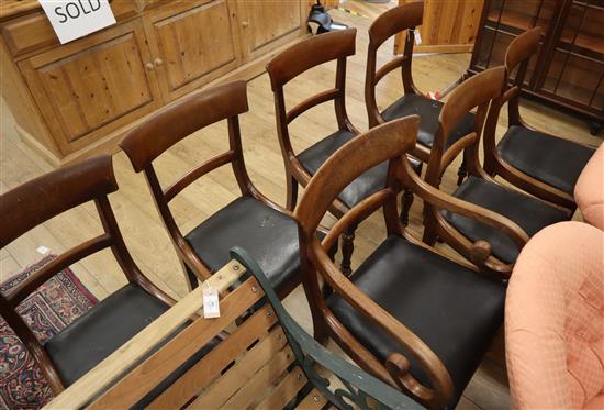 A set of seven William IV mahogany dining chairs (one having arms)